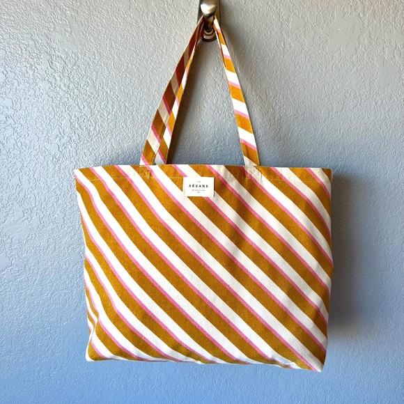 Sezane Handbags - PRICE IS FIRM**NWOT - Sezane diagonal striped pink, cream and beige/ yellow tote